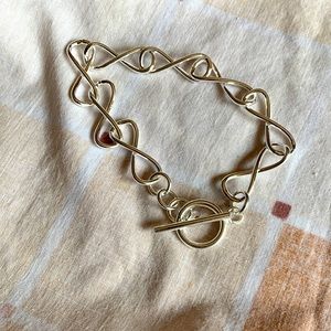 New Silver tone Lover's Knot Bracelet, toggle closure, 8"